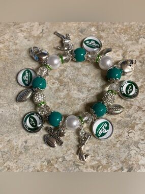 Green and White New York Jets football team bracelet with team charms